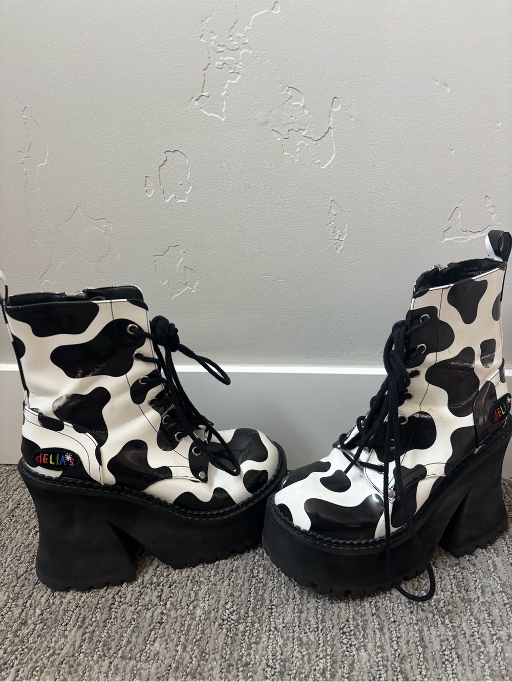dELiA*s Black and White Cow-Print Platform Lace-Up Boots